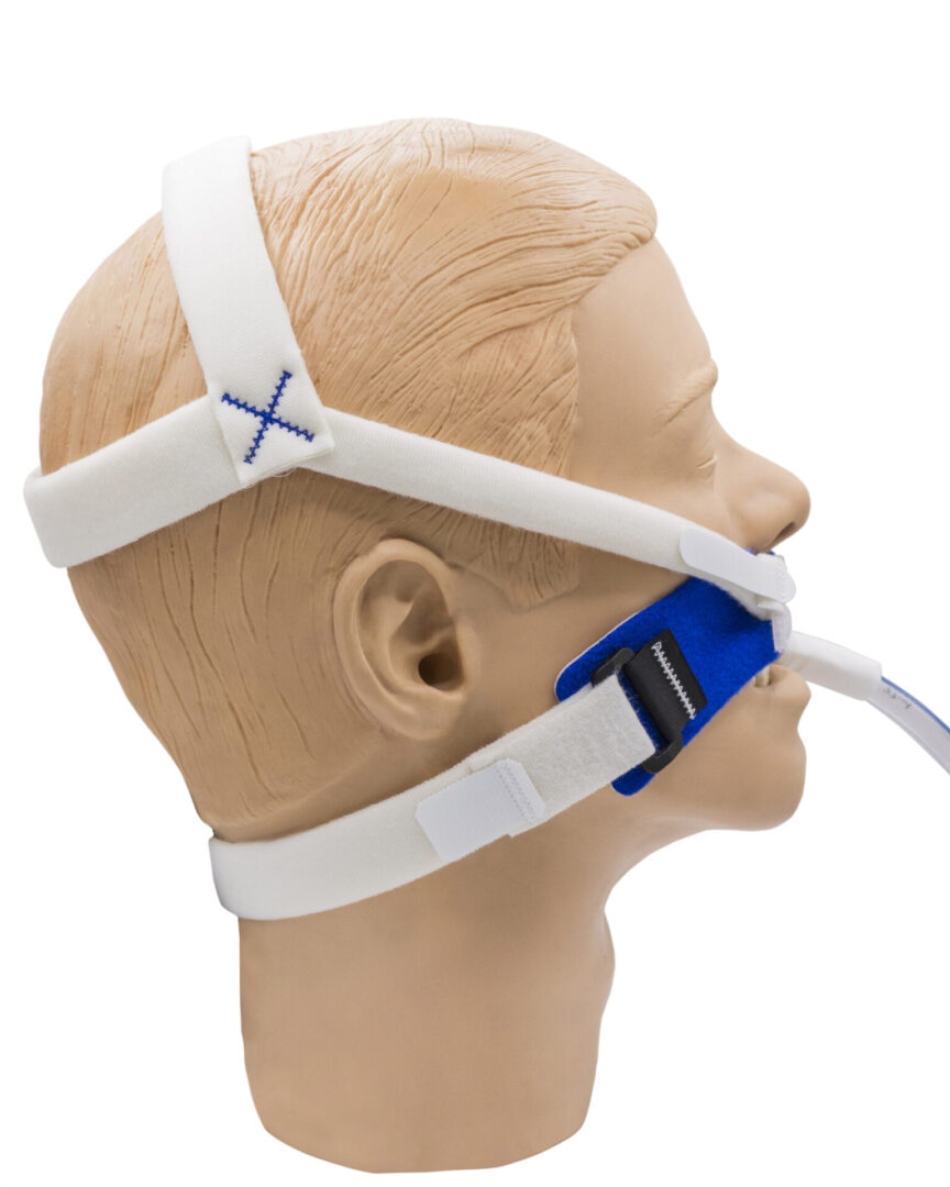 Non adhesive repositionable XL ET tube holder on mannequin right view