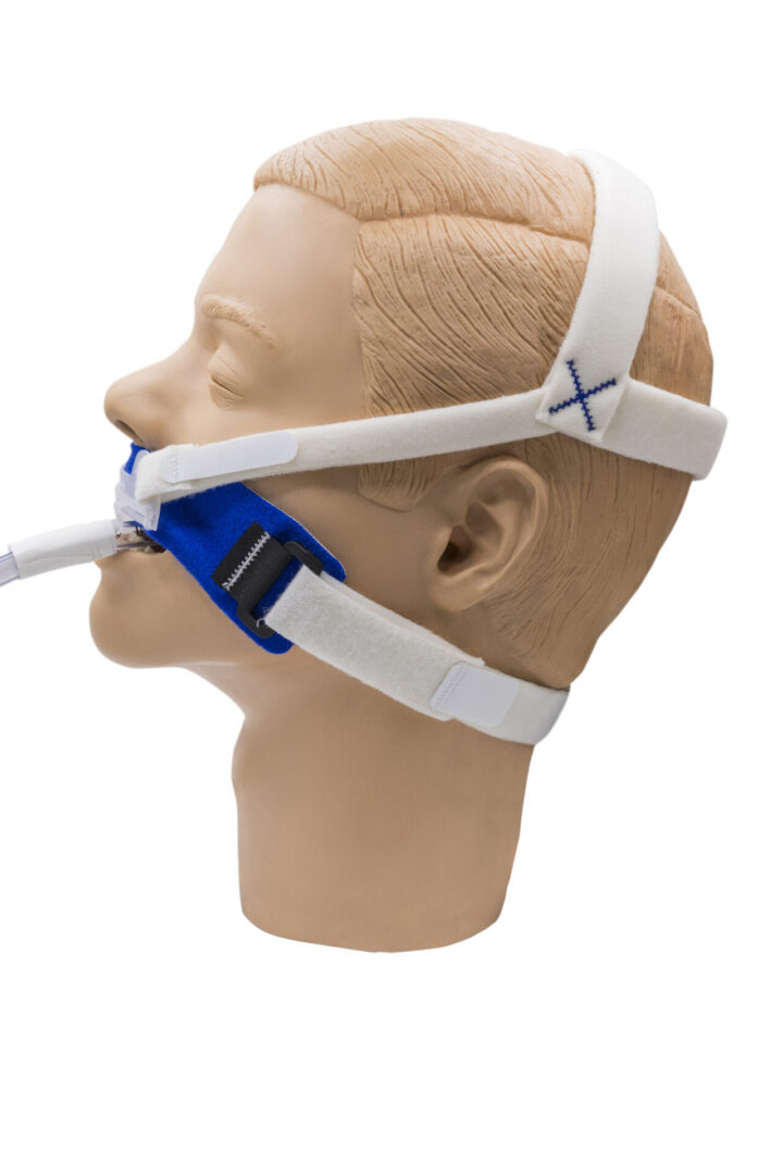 Non adhesive repositionable XL ET tube holder on mannequin left view