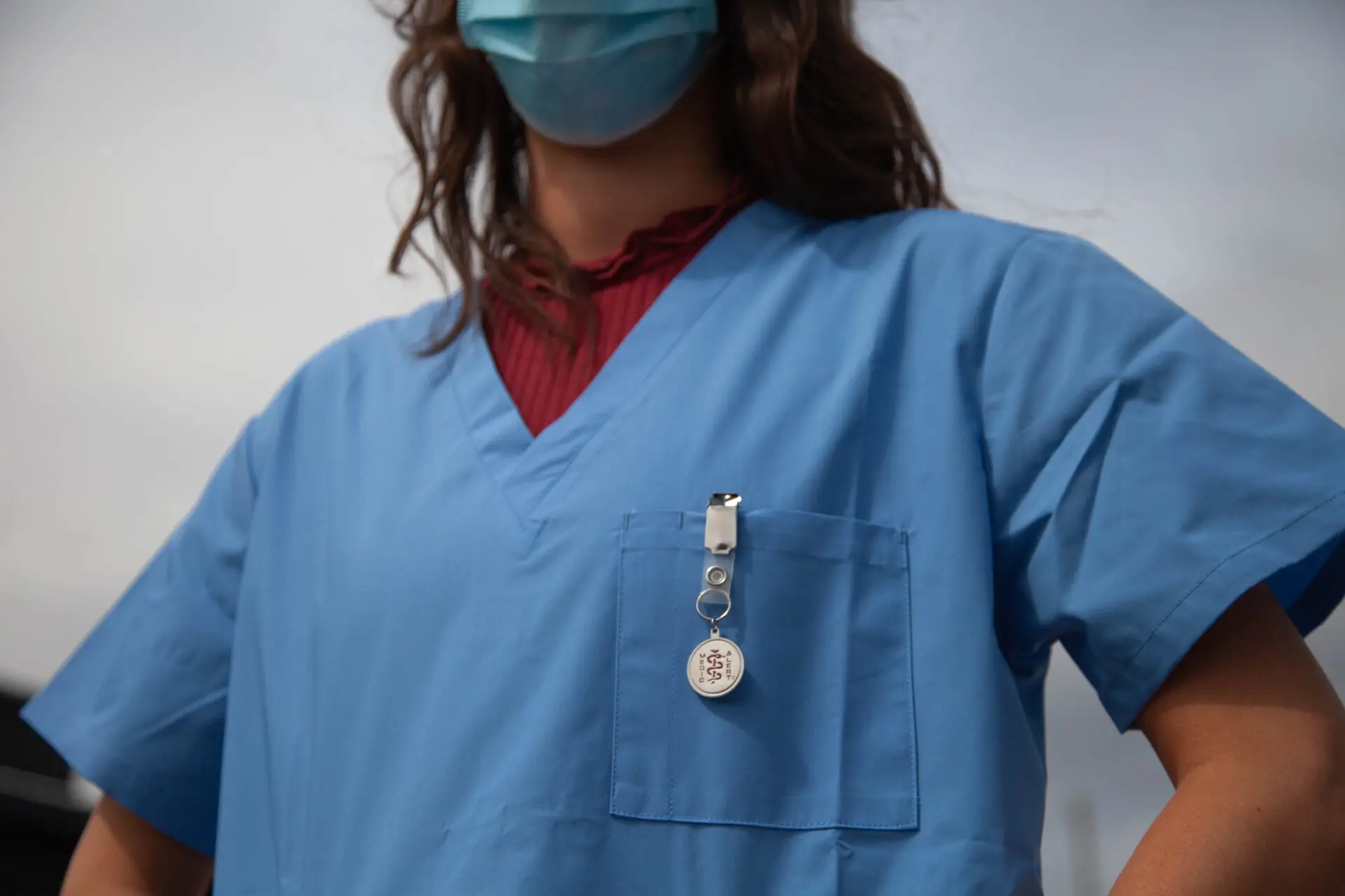 medical staff member with blue bg