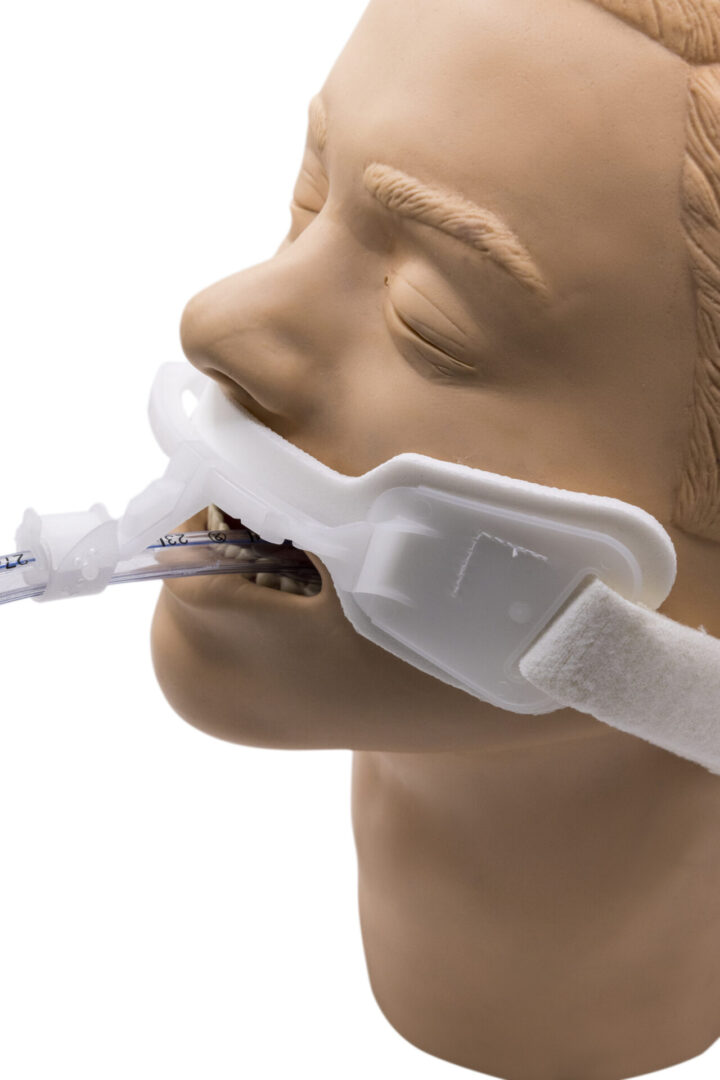 A mannequin with tube in his mouth-closeup